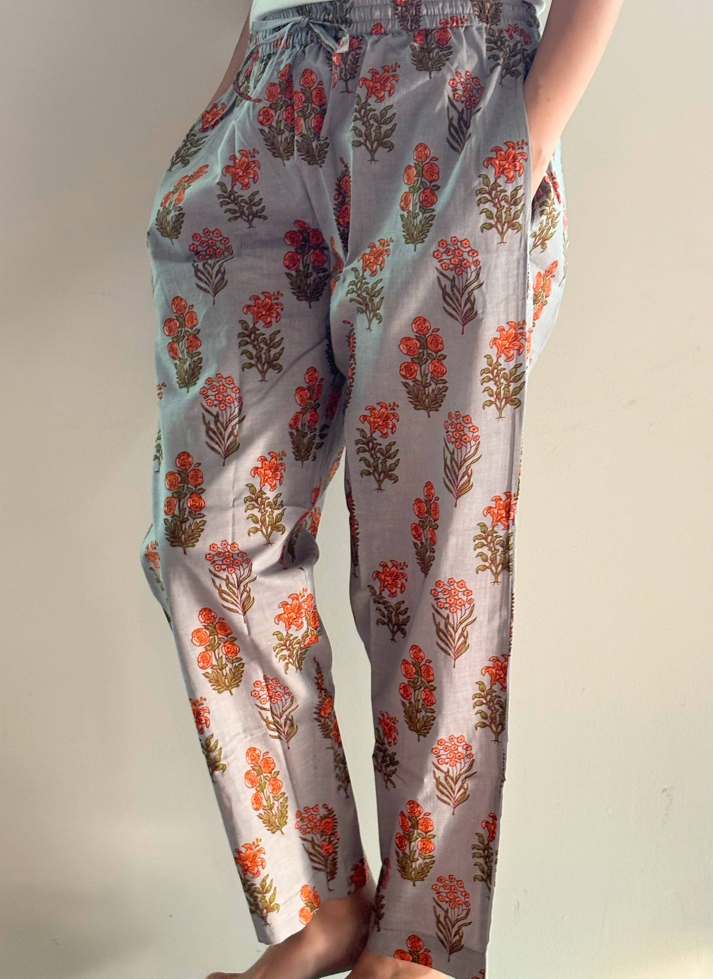Comfy and breathable 100% cotton floral lounge and sleep pants with an adjustable waistband, deep side pockets, and a beautiful floral print.