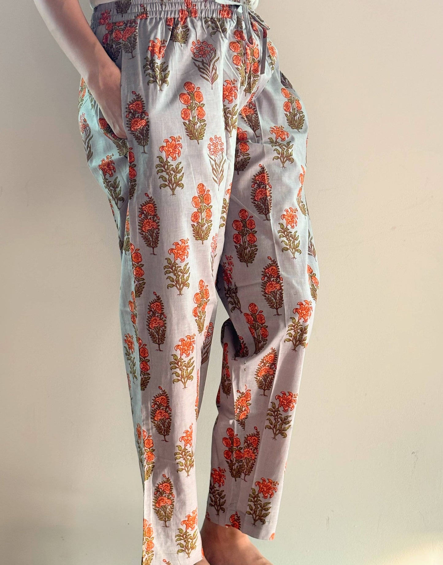 Comfy and breathable 100% cotton floral lounge and sleep pants with an adjustable waistband, deep side pockets, and a beautiful floral print.