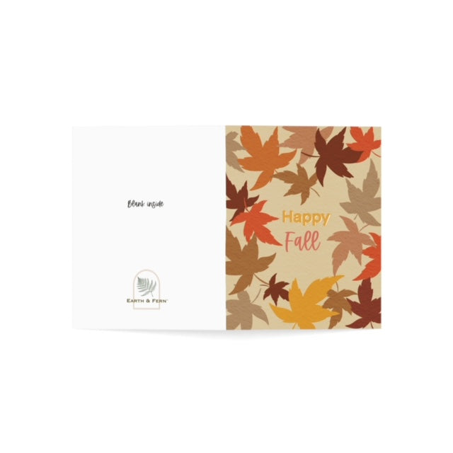 Mockup of fall greeting card displaying the front design with 'Happy Fall' and colorful leaves, and the back featuring the company logo and words blank inside.