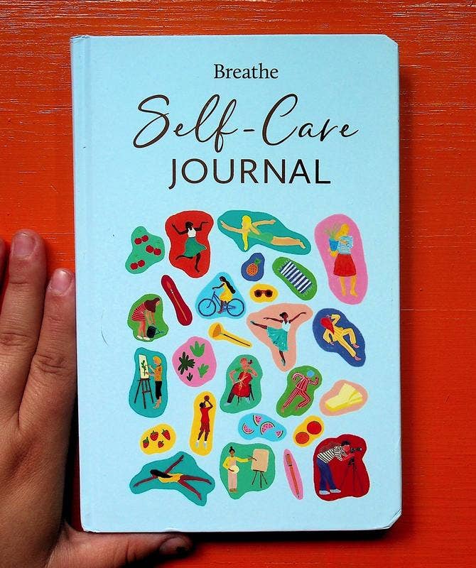 Self-care journal with guided prompts and journal entries designed to help readers slow down, practice mindfulness, and prioritize daily self-care.