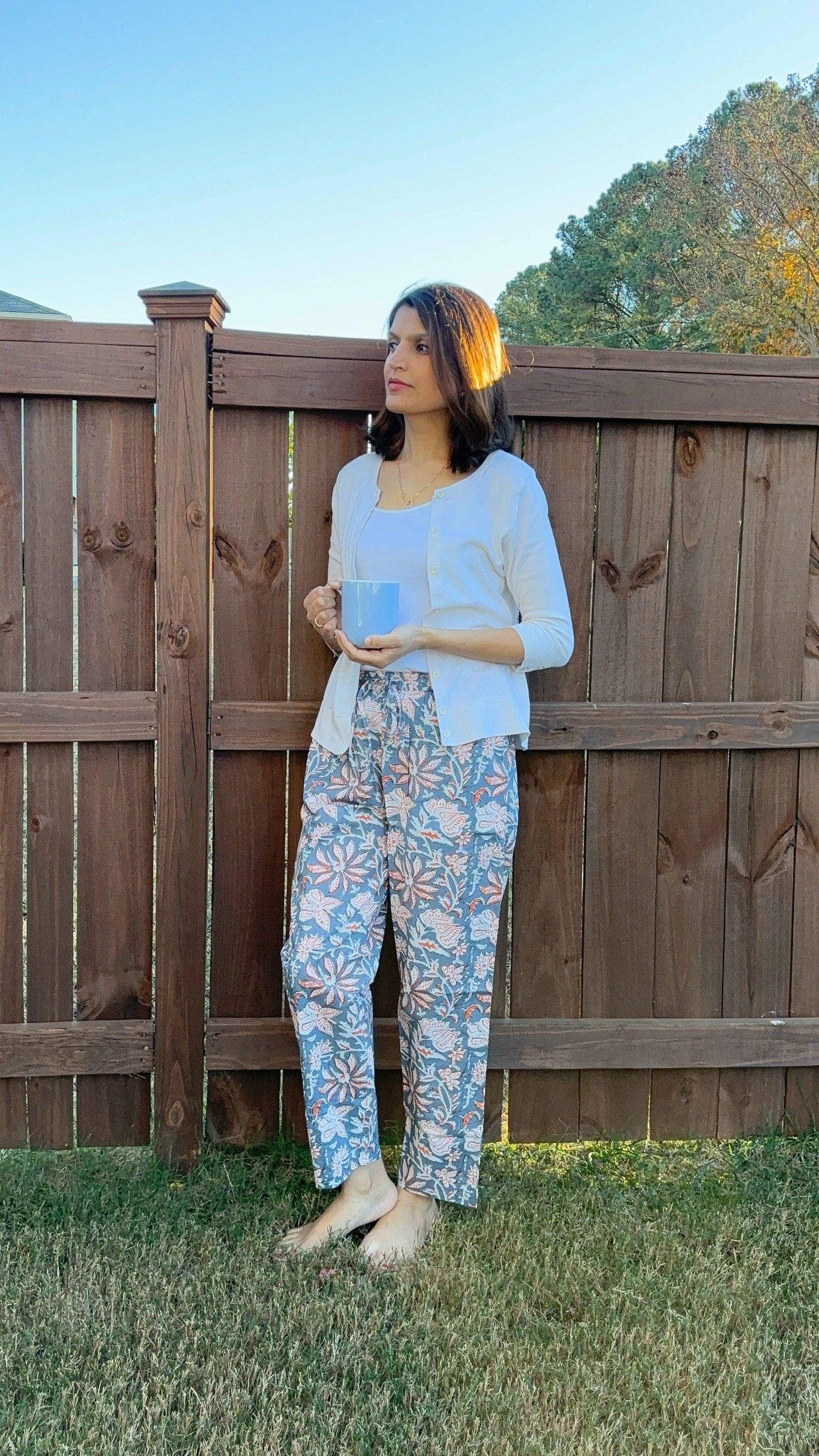 Preshrunk, 100% cotton.Adjustable waistband, big pockets. Comfy and breathable 100% cotton floral lounge and sleep pants with an adjustable waistband, deep side pockets, and a beautiful floral print.