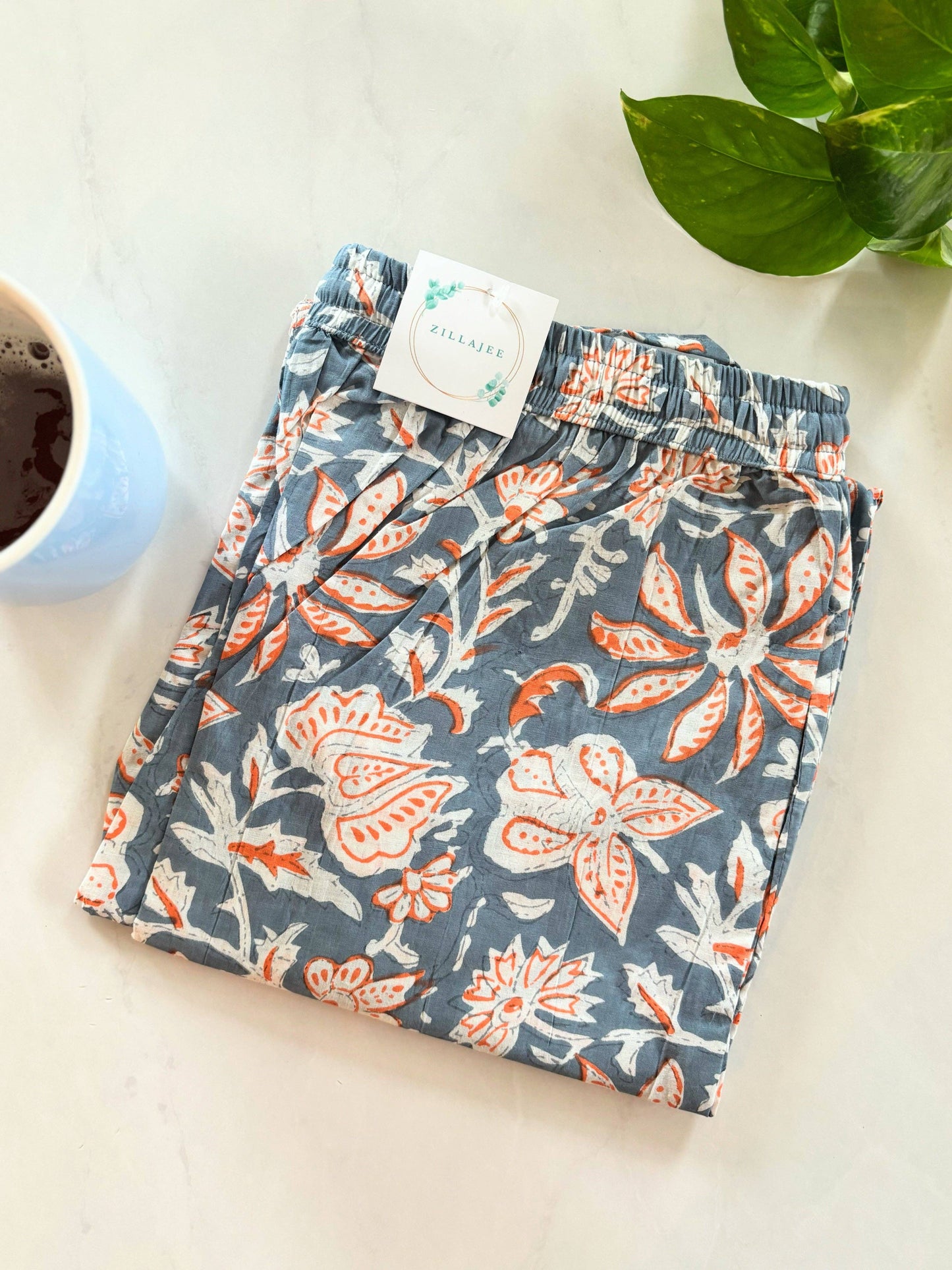 Preshrunk, 100% cotton.Adjustable waistband, big pockets. Comfy and breathable 100% cotton floral lounge and sleep pants with an adjustable waistband, deep side pockets, and a beautiful floral print.
