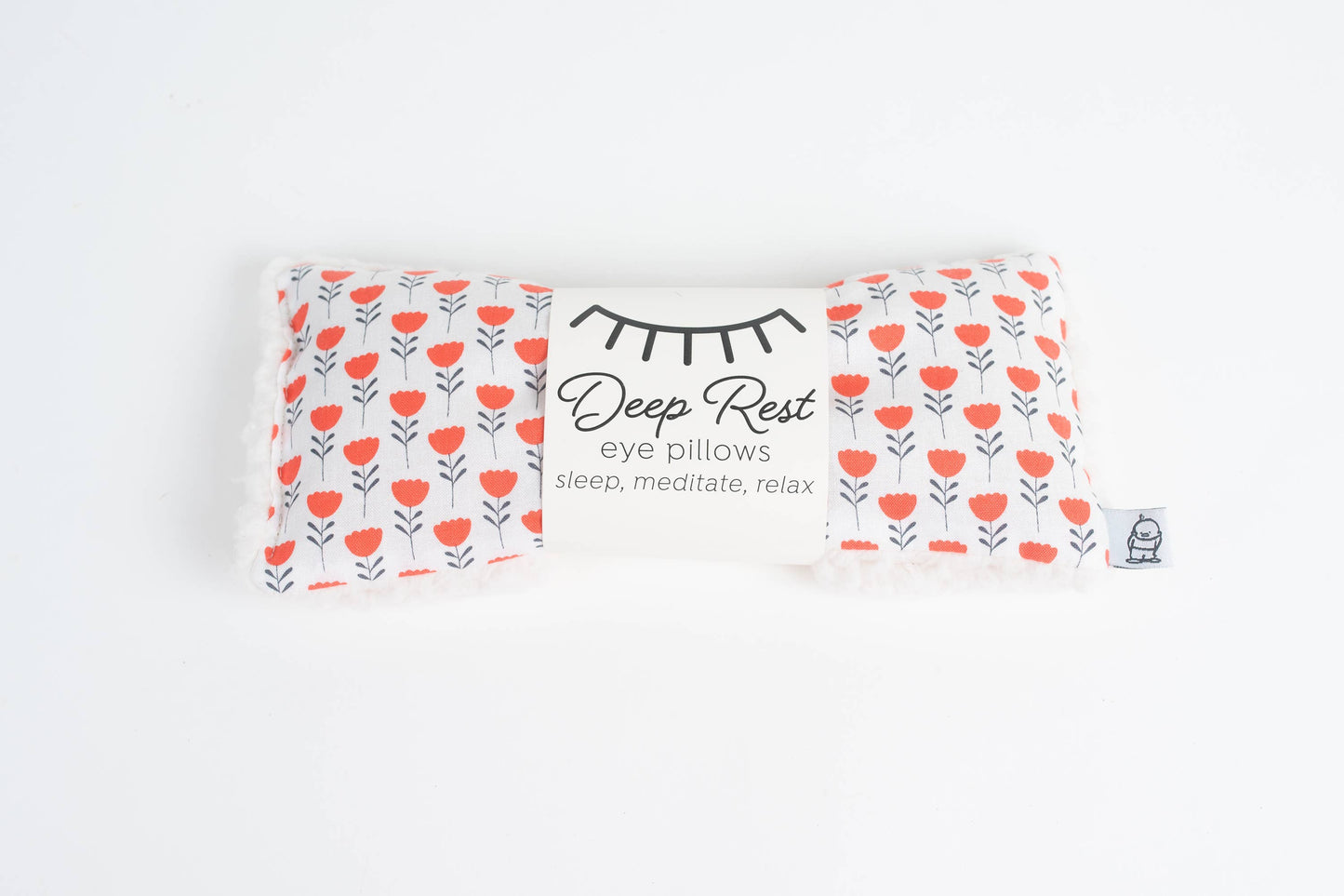 Deep Rest Eye Pillow for relaxation, stress relief, and sleep improvement. Features soft cotton front, minky backing, and soothing rice filling for acupressure and comfort. Can be used heated or chilled for enhanced relaxation