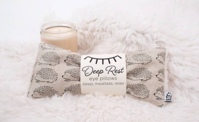 Deep Rest Eye Pillow with rice filling for relaxation, stress relief, and improved sleep, featuring a cotton front and soft minky backing, ideal for heating or cooling