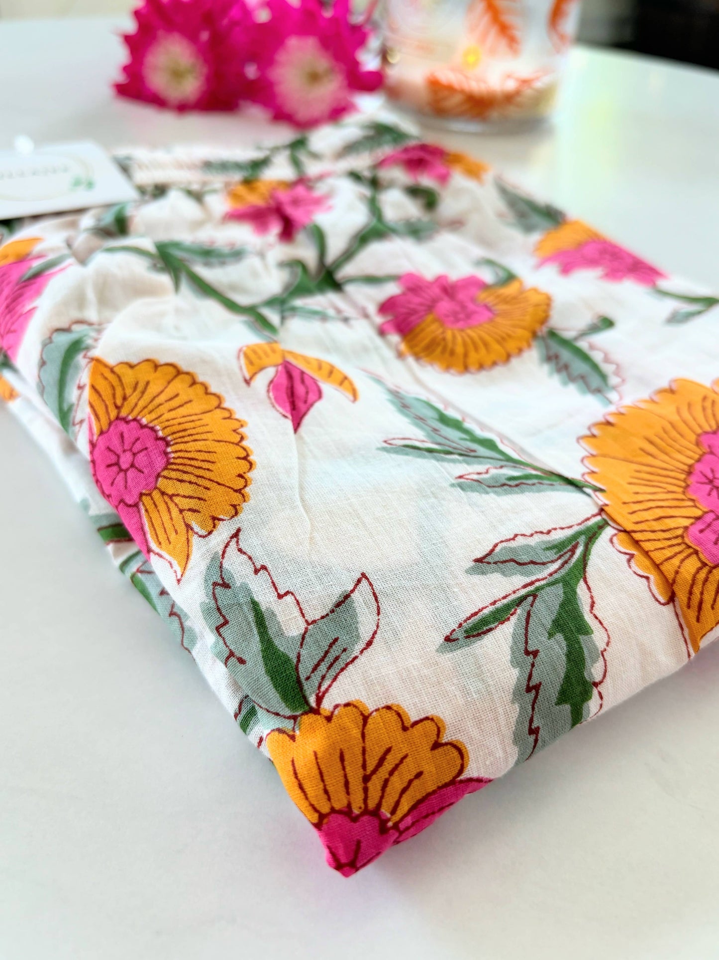 Preshrunk, 100% cotton.Adjustable waistband, big pockets. Comfy and breathable 100% cotton floral lounge and sleep pants with an adjustable waistband, deep side pockets, and a beautiful floral print.