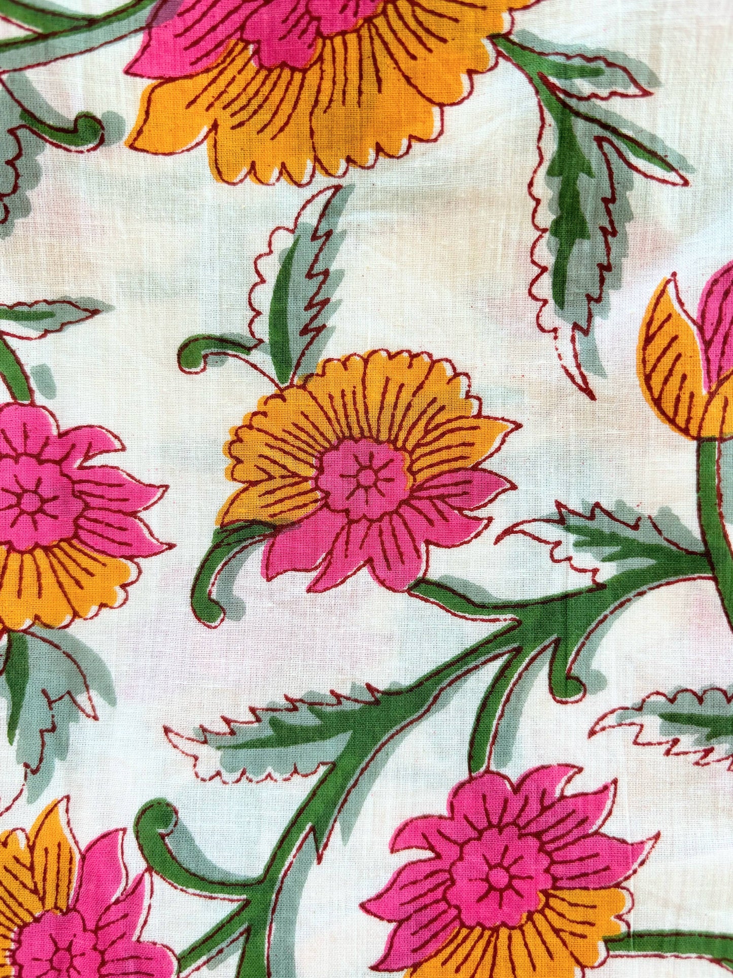 Soft white, with hot pink and orange blooms with green leaves vining throughout the pattern. Preshrunk, 100% cotton.Adjustable waistband, big pockets. Comfy and breathable 100% cotton floral lounge and sleep pants with an adjustable waistband, deep side pockets, and a beautiful floral print.