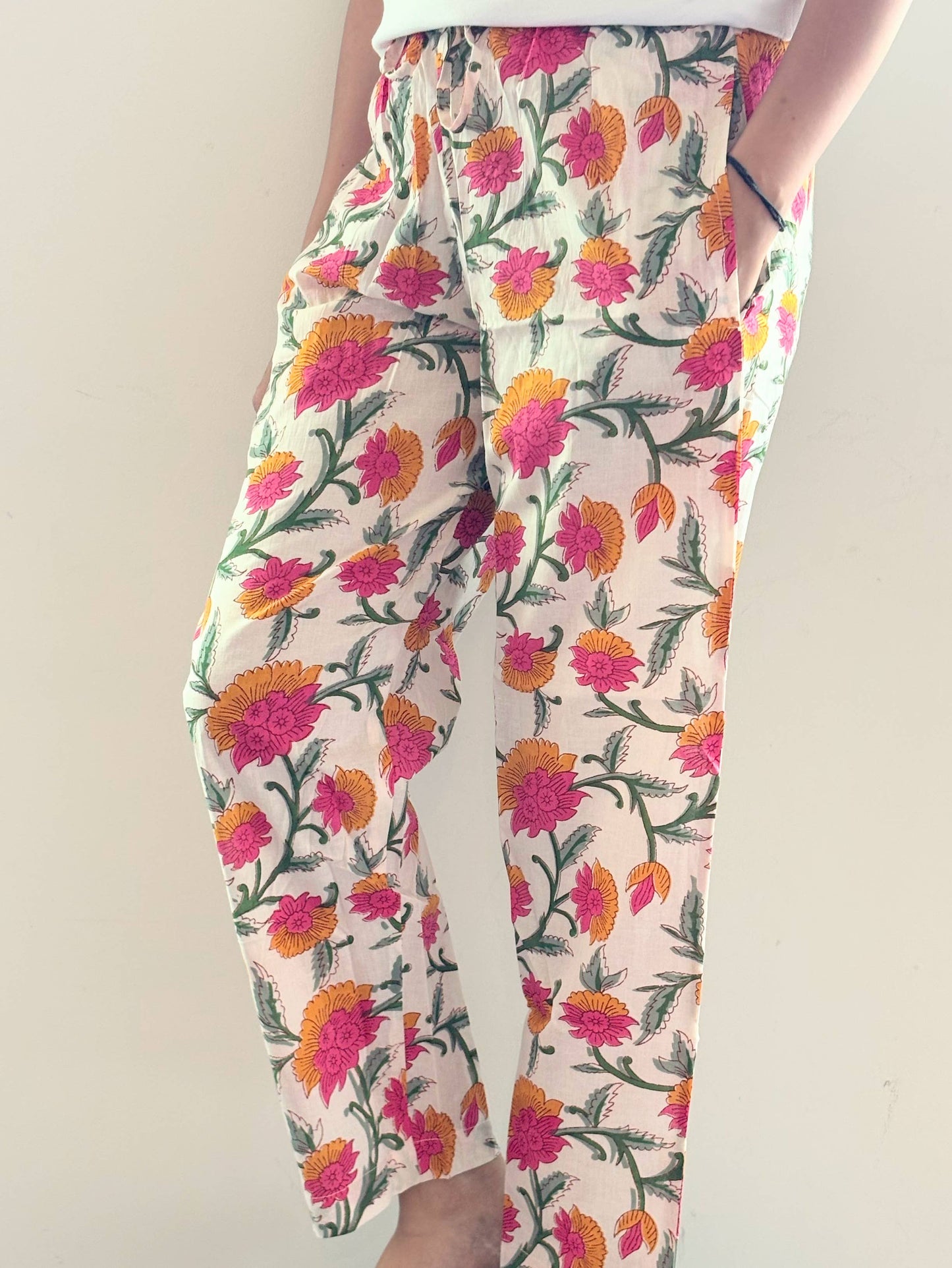 Preshrunk, 100% cotton.Adjustable waistband, big pockets. Comfy and breathable 100% cotton floral lounge and sleep pants with an adjustable waistband, deep side pockets, and a beautiful floral print.