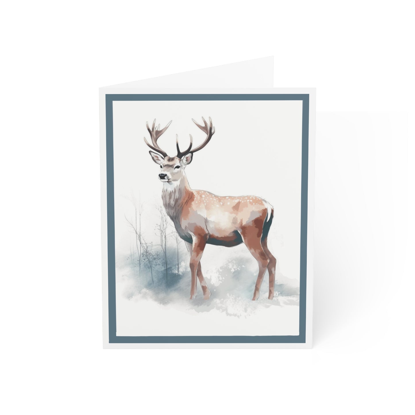 Card shows a white background with dusty blue border. Inside is white , depicting winter with a single brown deer , standing amid the white abstract strokes, a buck with his antlers, standing proudly , looking forward.