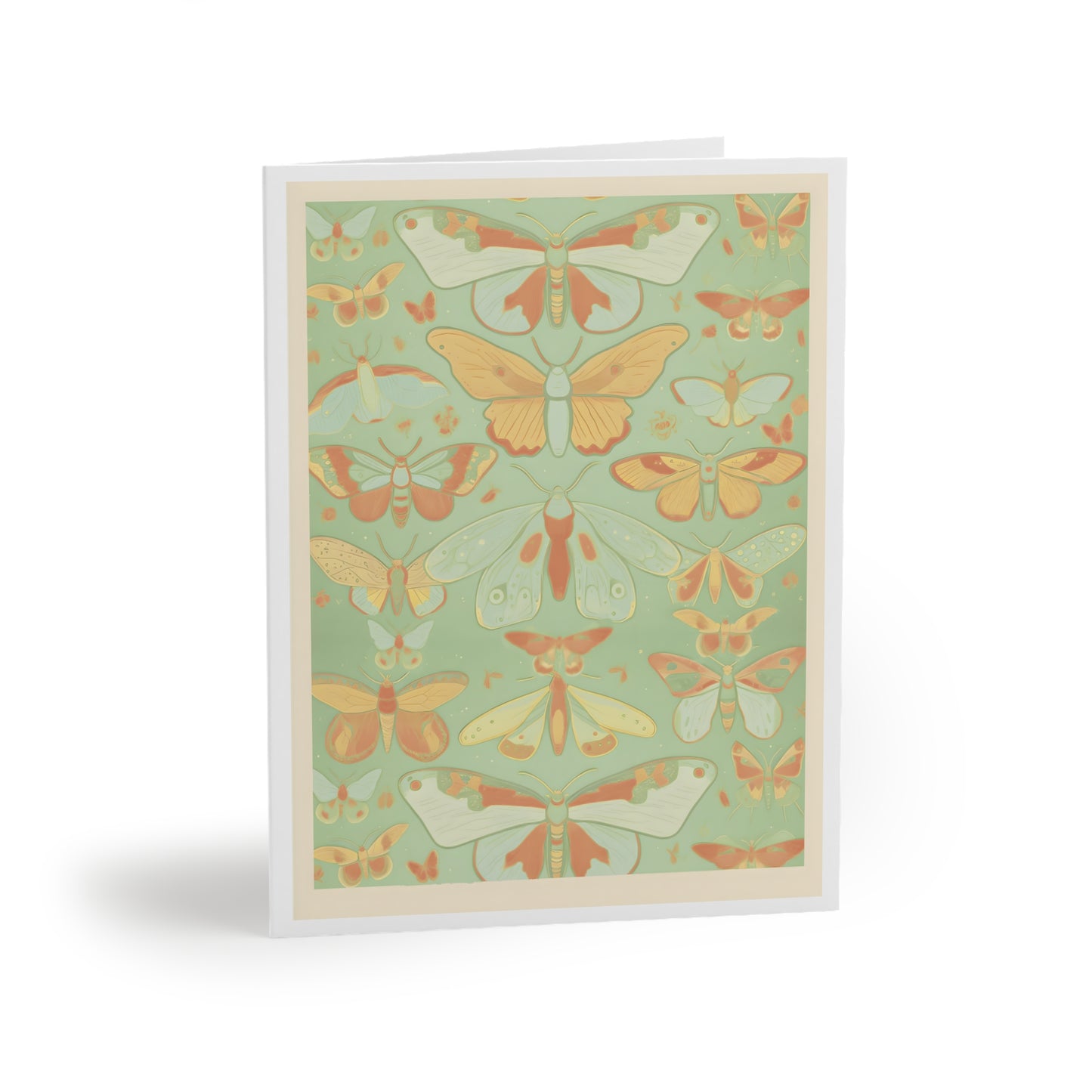 Image shows a greeting card with rows of butterflies in a collection. The butterflies are colored in shades of light mint, yellow and orange. On a medium mint background with a double border of cream and white.