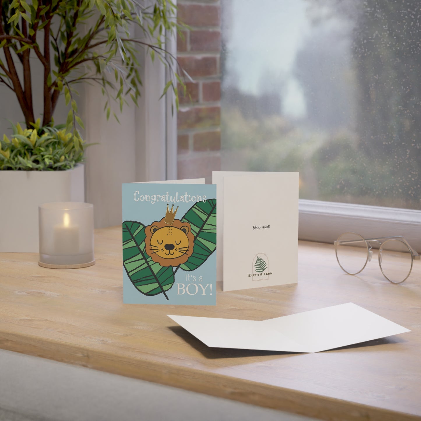 Card shows the inside to be blank and the back has the words blank inside and the Earth and Fern logo at the bottom.