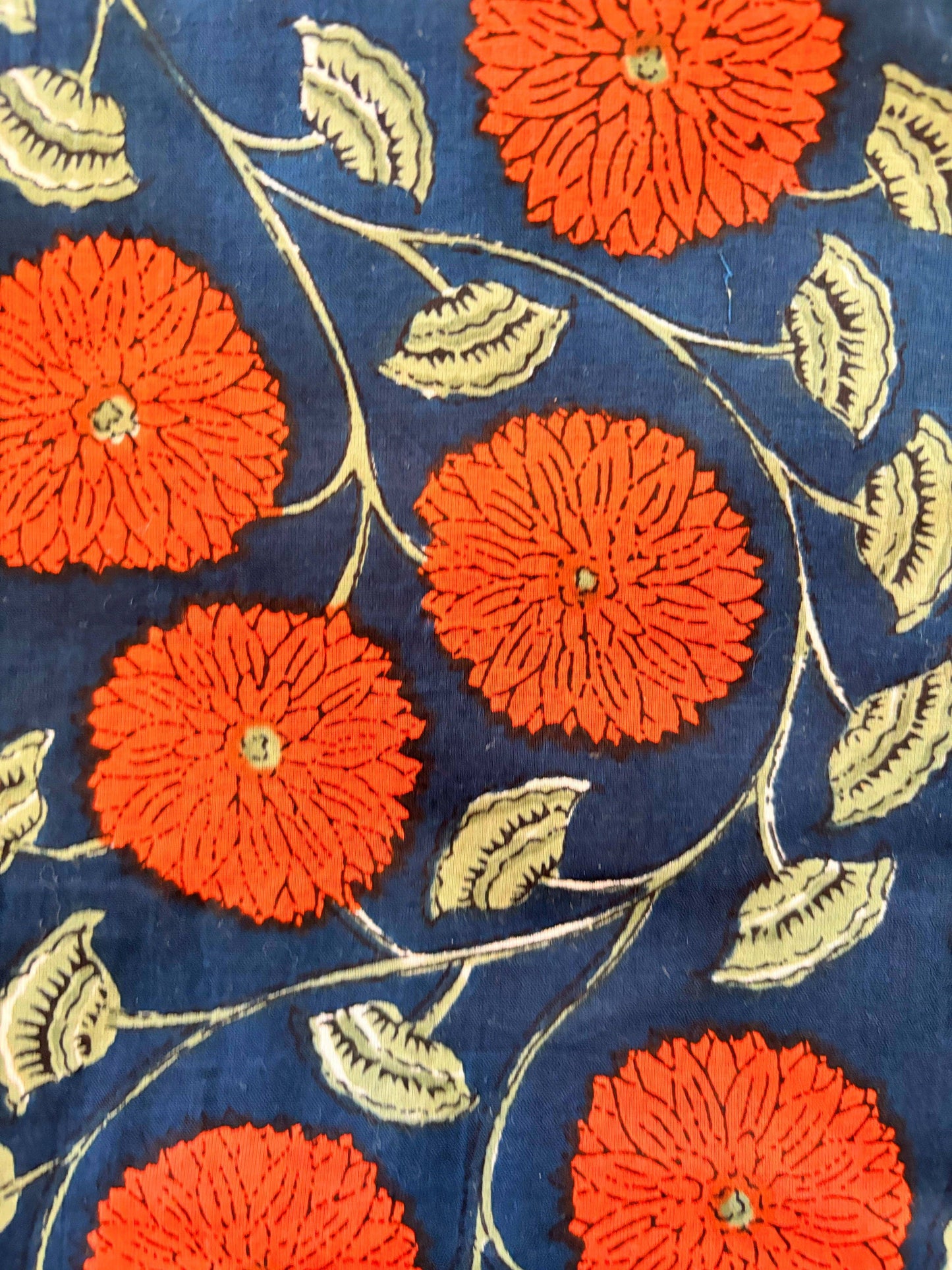 royal/Navy blue pants with orange red blooms and light sage leaves vining throughout. Preshrunk, 100% cotton.Adjustable waistband, big pockets. Comfy and breathable 100% cotton floral lounge and sleep pants with an adjustable waistband, deep side pockets, and a beautiful floral print.