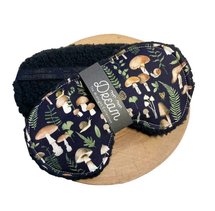 Midnight Collection sleep mask featuring 100% cotton front and soft black Sherpa backing, designed for relaxation and a comfortable sleep experience