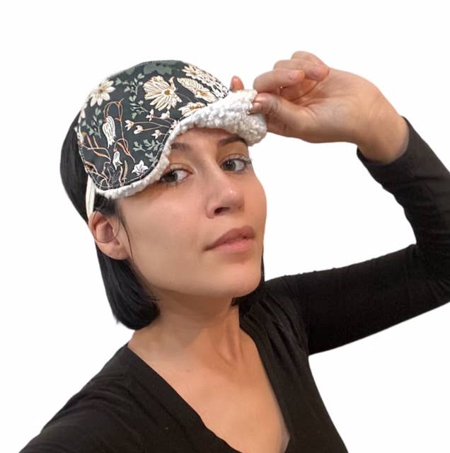 Midnight Collection sleep mask featuring 100% cotton front and soft black Sherpa backing, designed for relaxation and a comfortable sleep experience