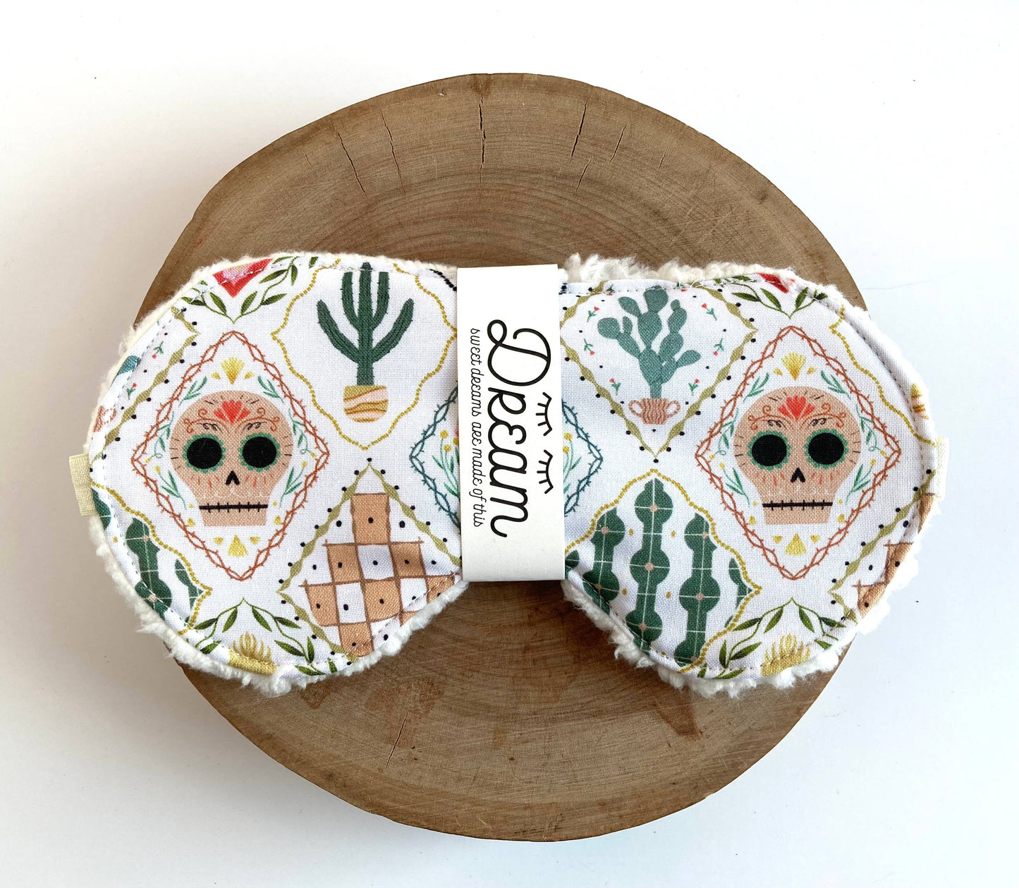 Midnight Collection sleep mask featuring 100% cotton front and soft black Sherpa backing, designed for relaxation and a comfortable sleep experience