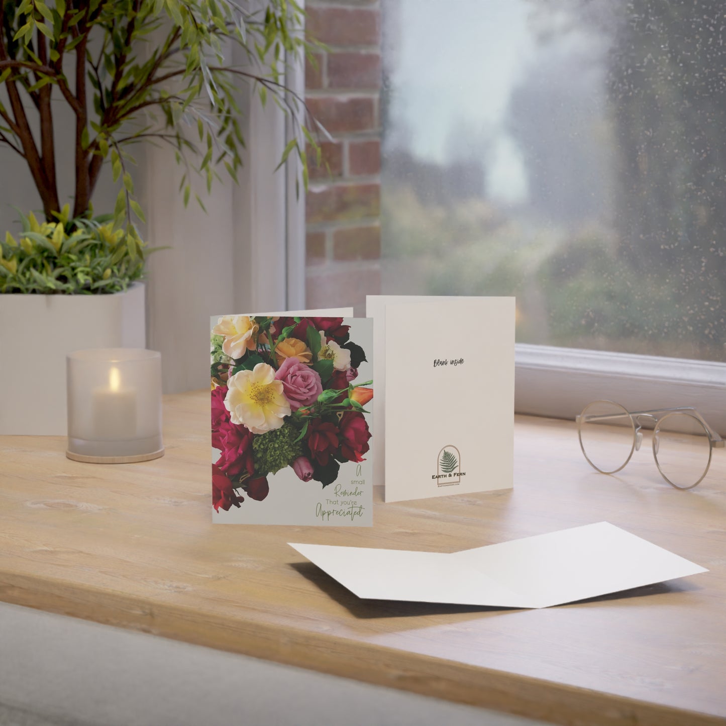 Eco-friendly appreciation card featuring a vibrant bouquet of roses and baby hydrangeas with the words “A Small Reminder That You’re Appreciated