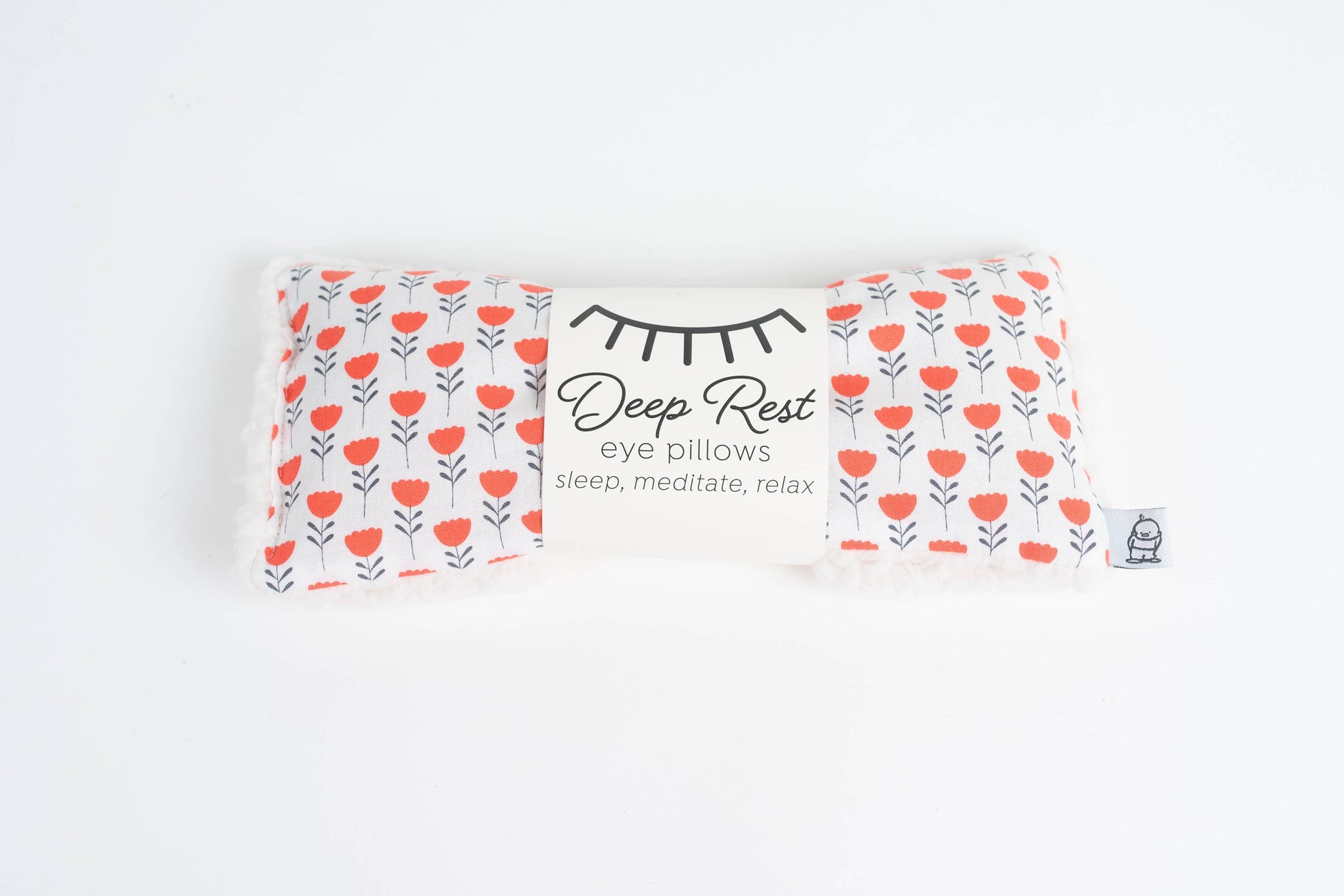 Deep Rest Eye Pillow for relaxation, stress relief, and sleep improvement. Features soft cotton front, minky backing, and soothing rice filling for acupressure and comfort. Can be used heated or chilled for enhanced relaxation