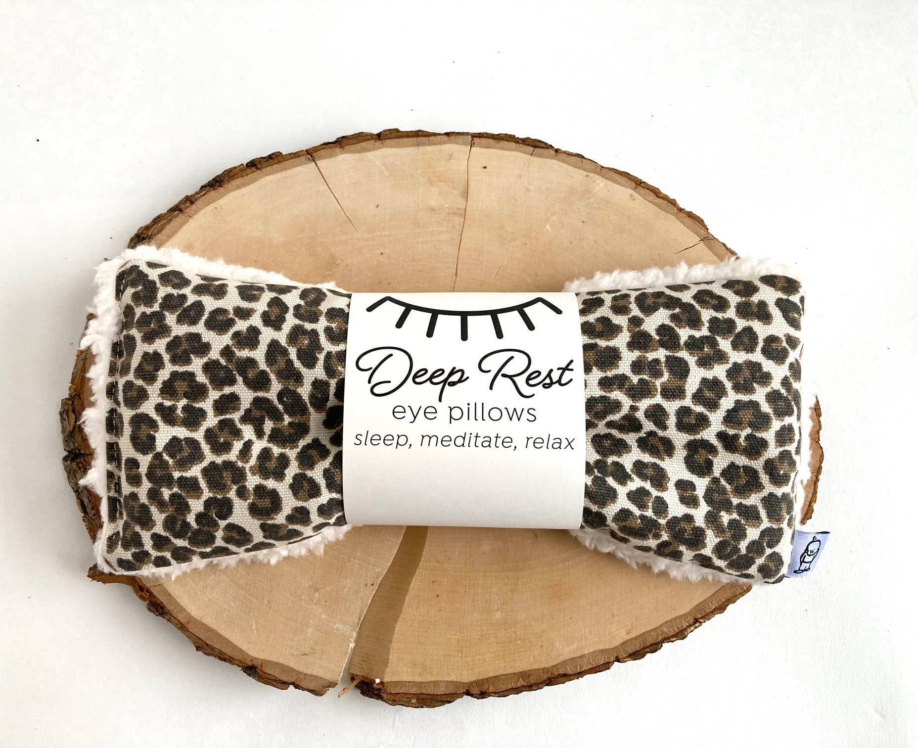 Deep Rest Eye Pillow with rice filling for relaxation, stress relief, and improved sleep, featuring a cotton front and soft minky backing, ideal for heating or cooling