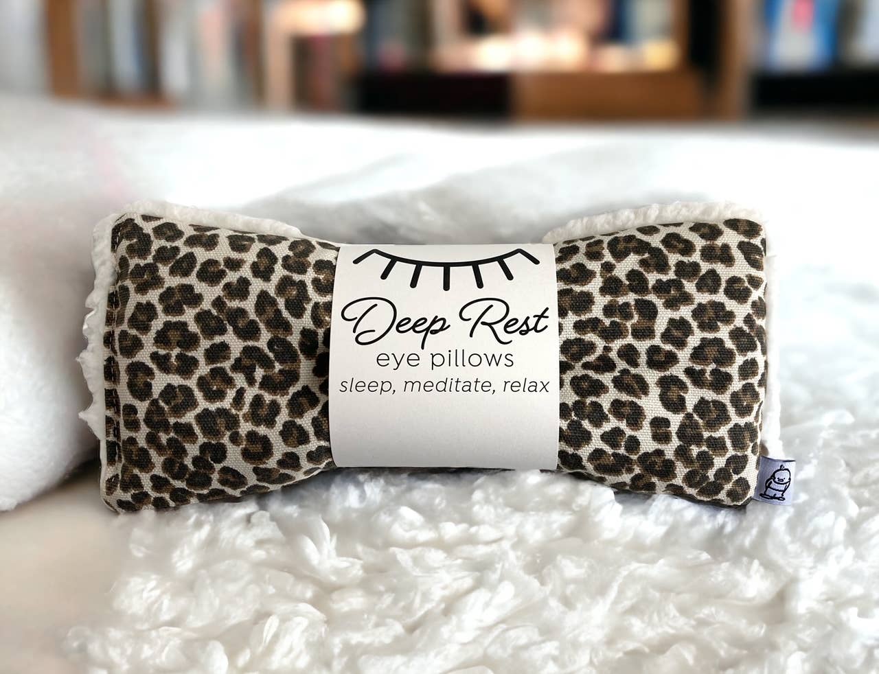 Deep Rest Eye Pillow with rice filling for relaxation, stress relief, and improved sleep, featuring a cotton front and soft minky backing, ideal for heating or cooling 