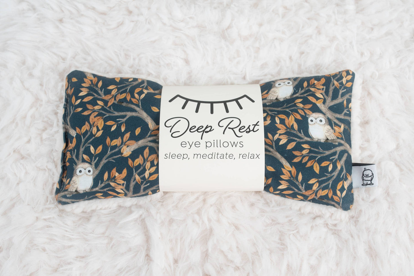 Turquoise blue with light gray owls sitting on delicate tree limbs - Deep Rest Eye Pillow with rice filling for relaxation, stress relief, and improved sleep, featuring a cotton front and soft minky backing, ideal for heating or cooling.