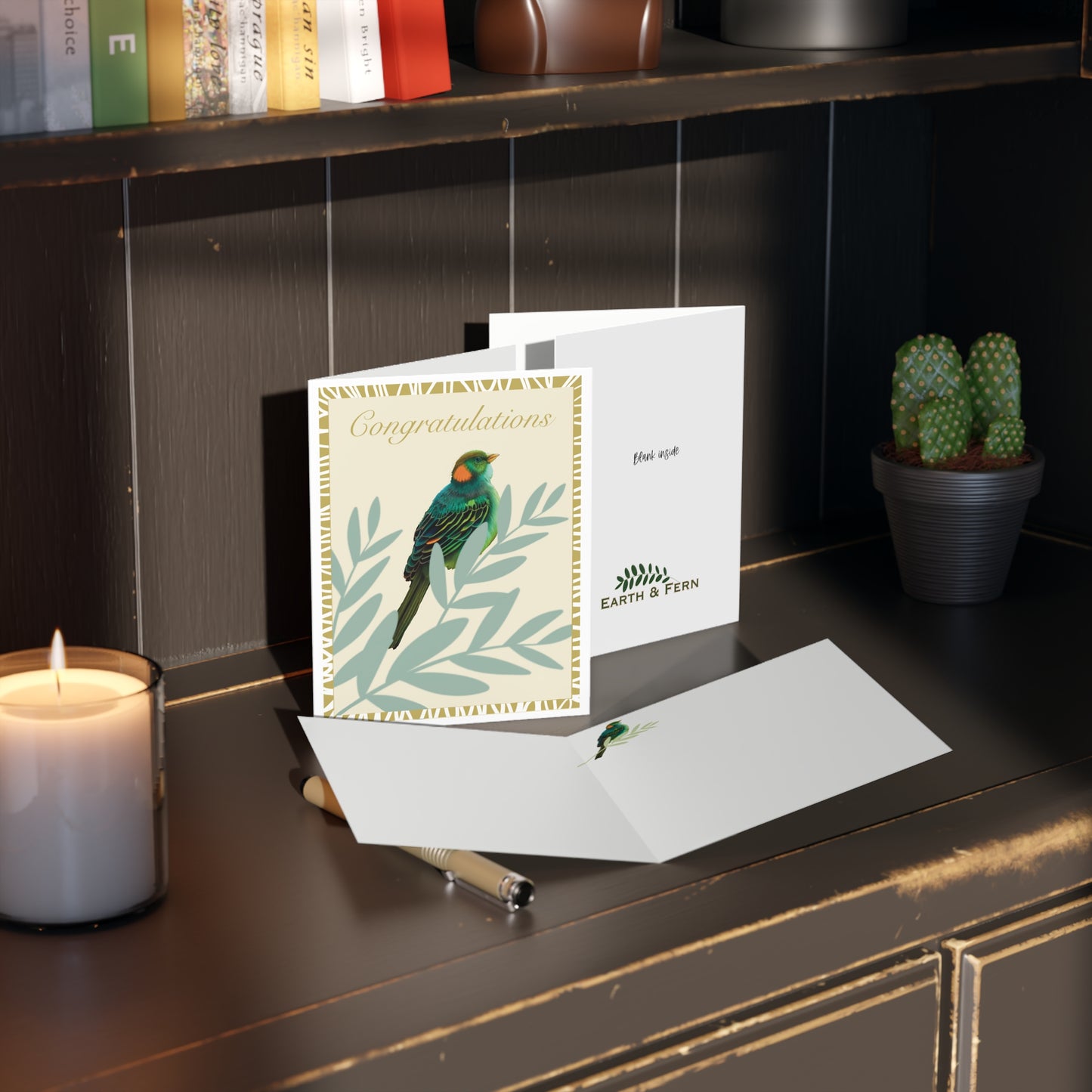 Card shows the inside to be blank, with the exception of a tiny matching bird on a leaf inside that mimics the front cover. No words inside. The back states blank inside and the Earth and Fern logo.