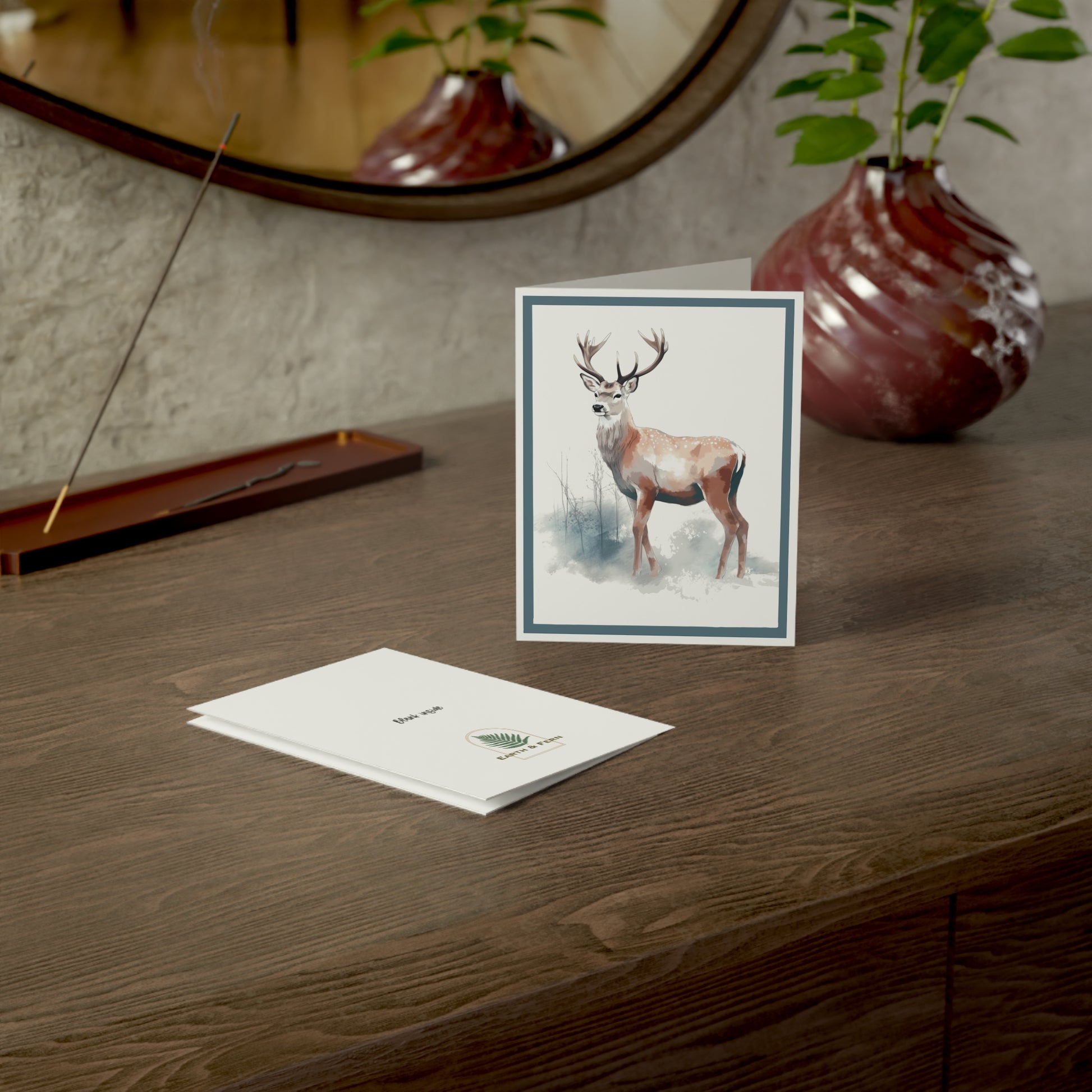 Card shows the inside to be blank and the back has the words blank inside and the Earth and Fern logo below.