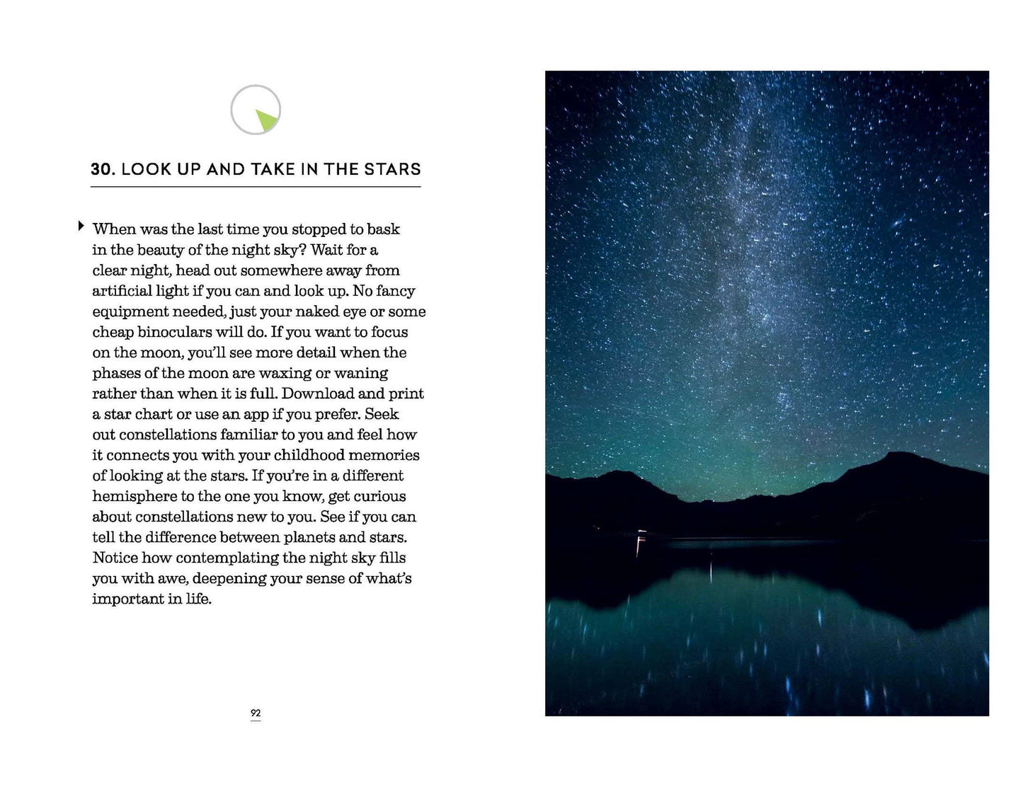 Page from a book or magazine with text and a night sky image on a white background