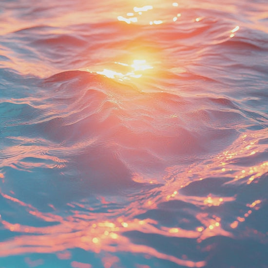 Ocean waves video with sunlight dappling off the water.
